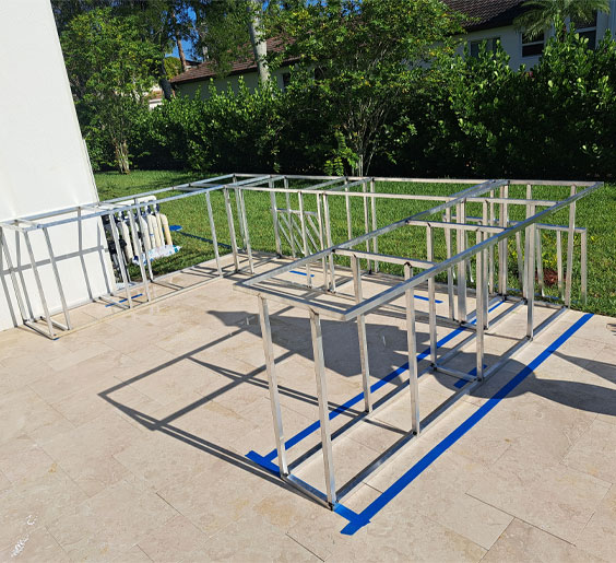 Sleek custome steel fabrication Miami frame in the outdoor space