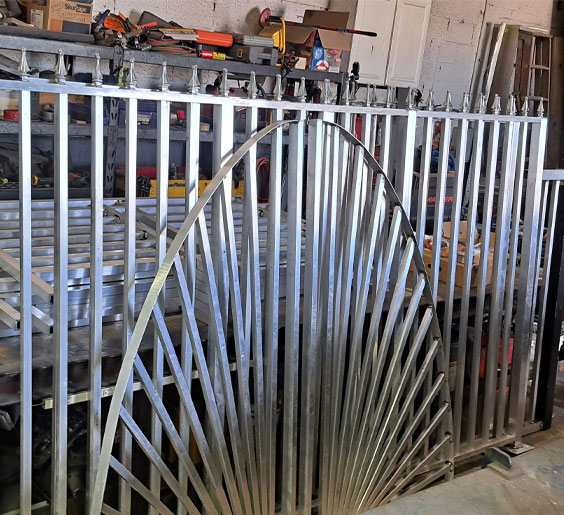 A sturdy metal fence inside a metal shop Miami FL workstation.